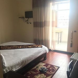 Kamer met een Queen Size Bed